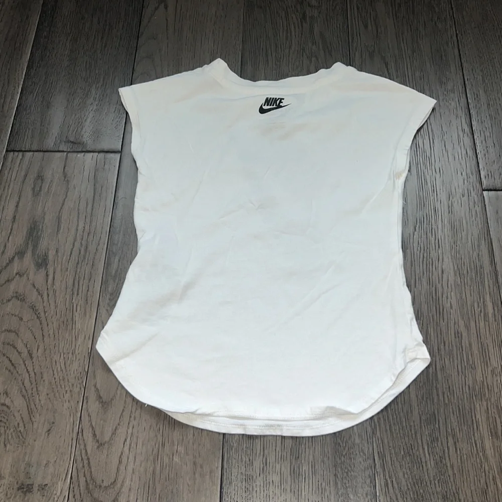 Girls Nike cut off sleeve glitter like Nike logo T-shirt